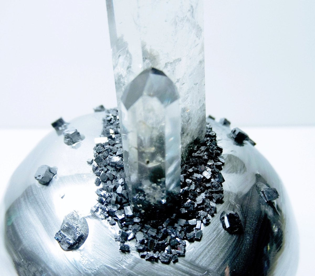 Macro detail of cut quartz showing natural internal fracture and light refraction