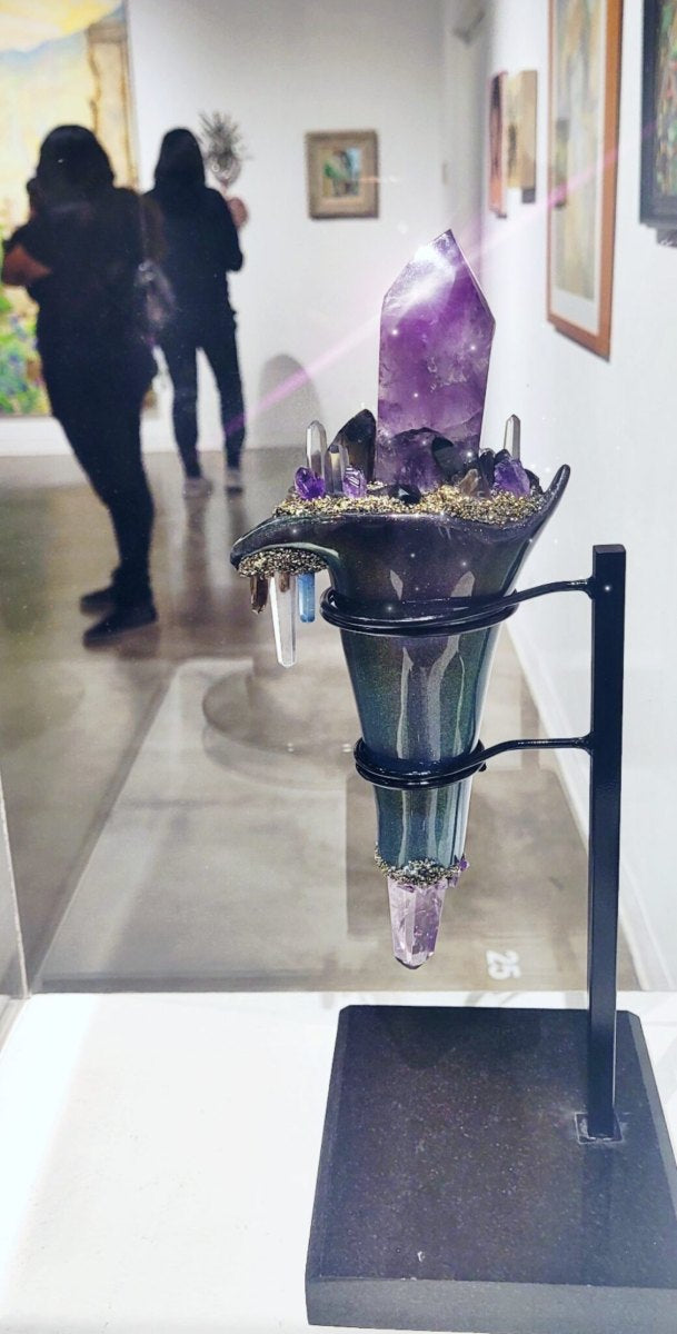 Amethyst and pyrite cone sculpture on stand, Xicana! at El Camino College